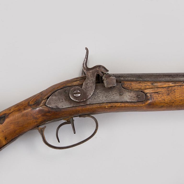 A double barrel caplock rifle mid 1800s.