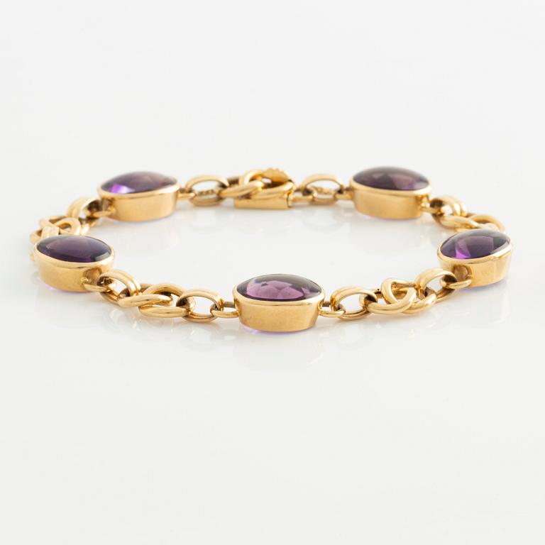 Bracelet and ring, 18K gold with cabochon-cut amethysts.