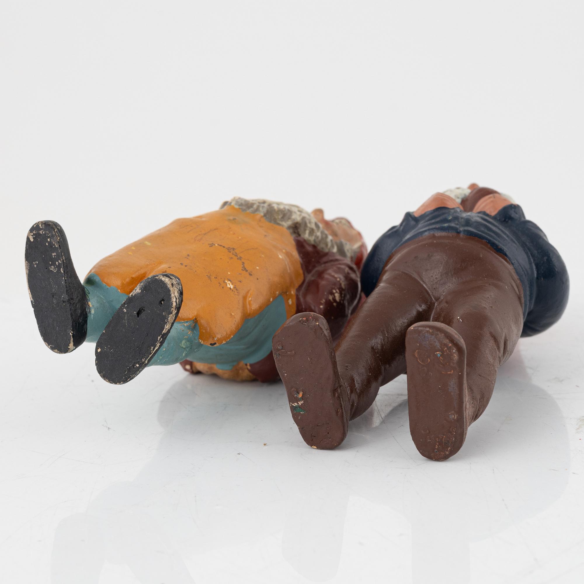 A group of seven gnomes, first half of the 20th Century.