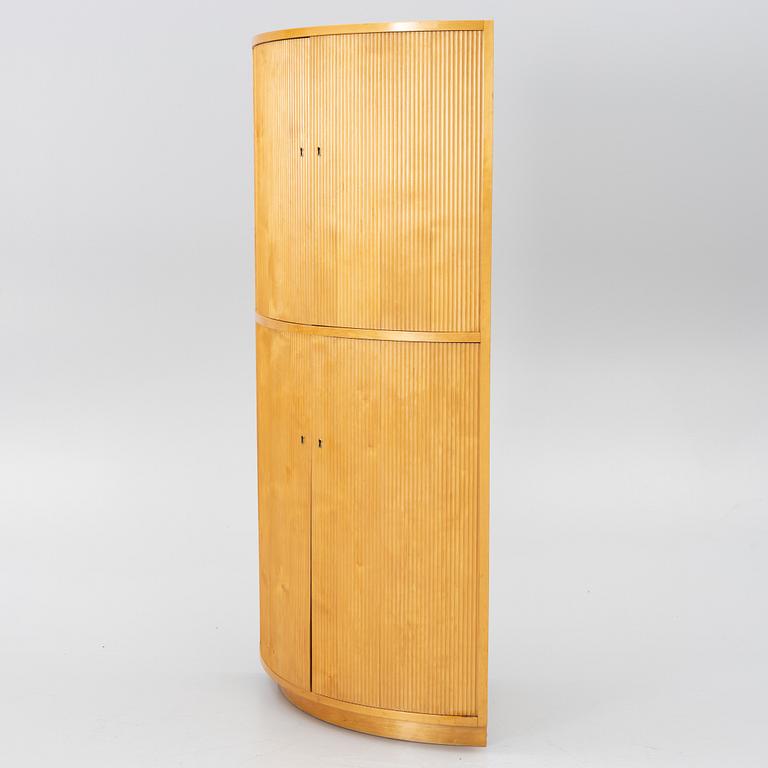 Corner cabinet, circa the mid-20th century.
