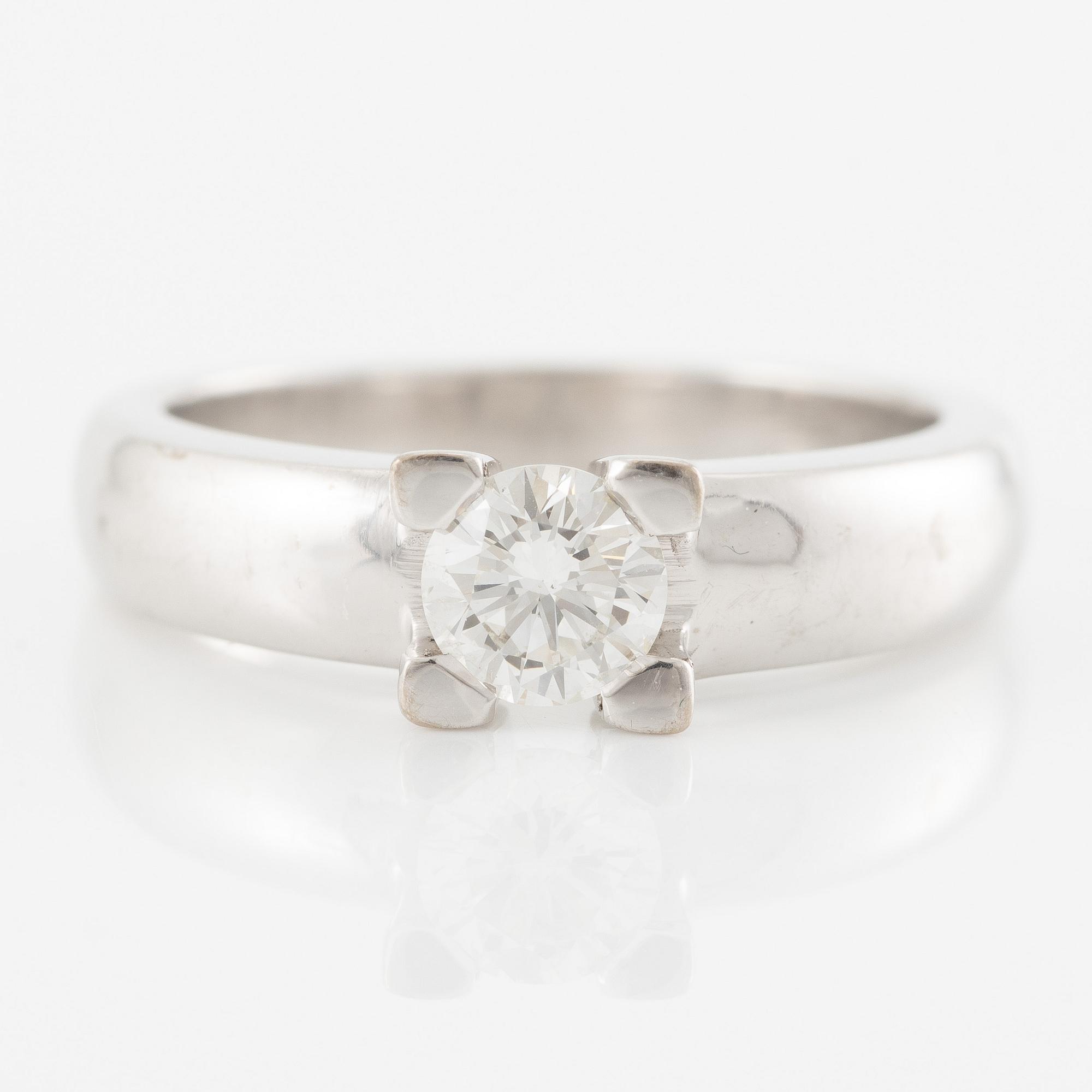 Ring in 18K white gold set with a brilliant-cut diamond weighing 0.49 ct according to the engraving.