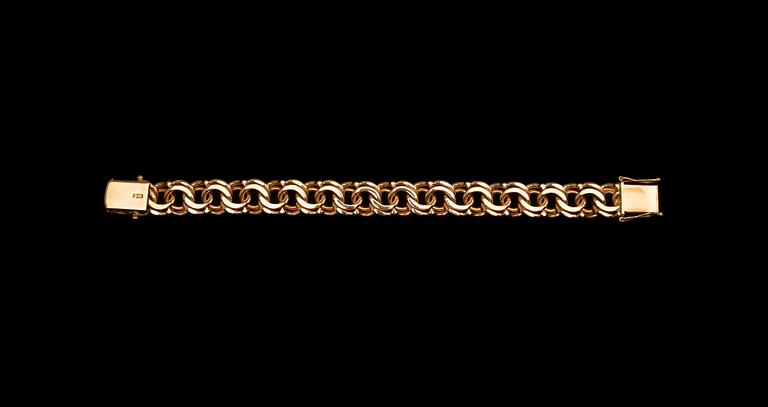 A BRACELET, "bismarck" 14K gold Finland 1999, hand crafted. Width14,5 mm, length 20 cm, weight 82 g.