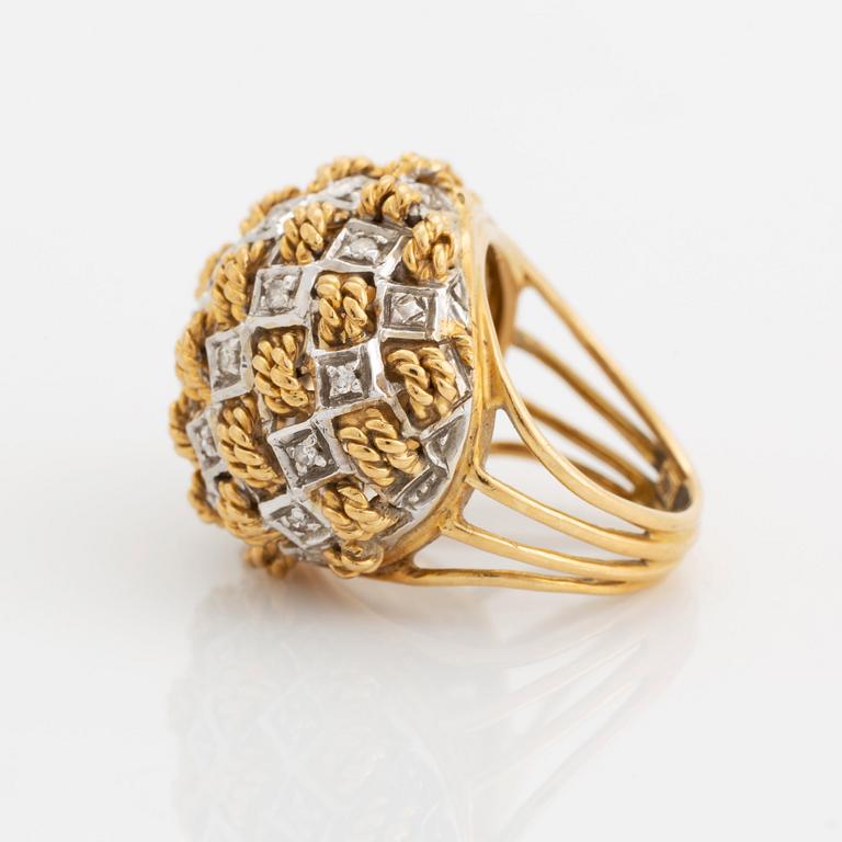 An 18K gold ring set with eight-cut diamonds.