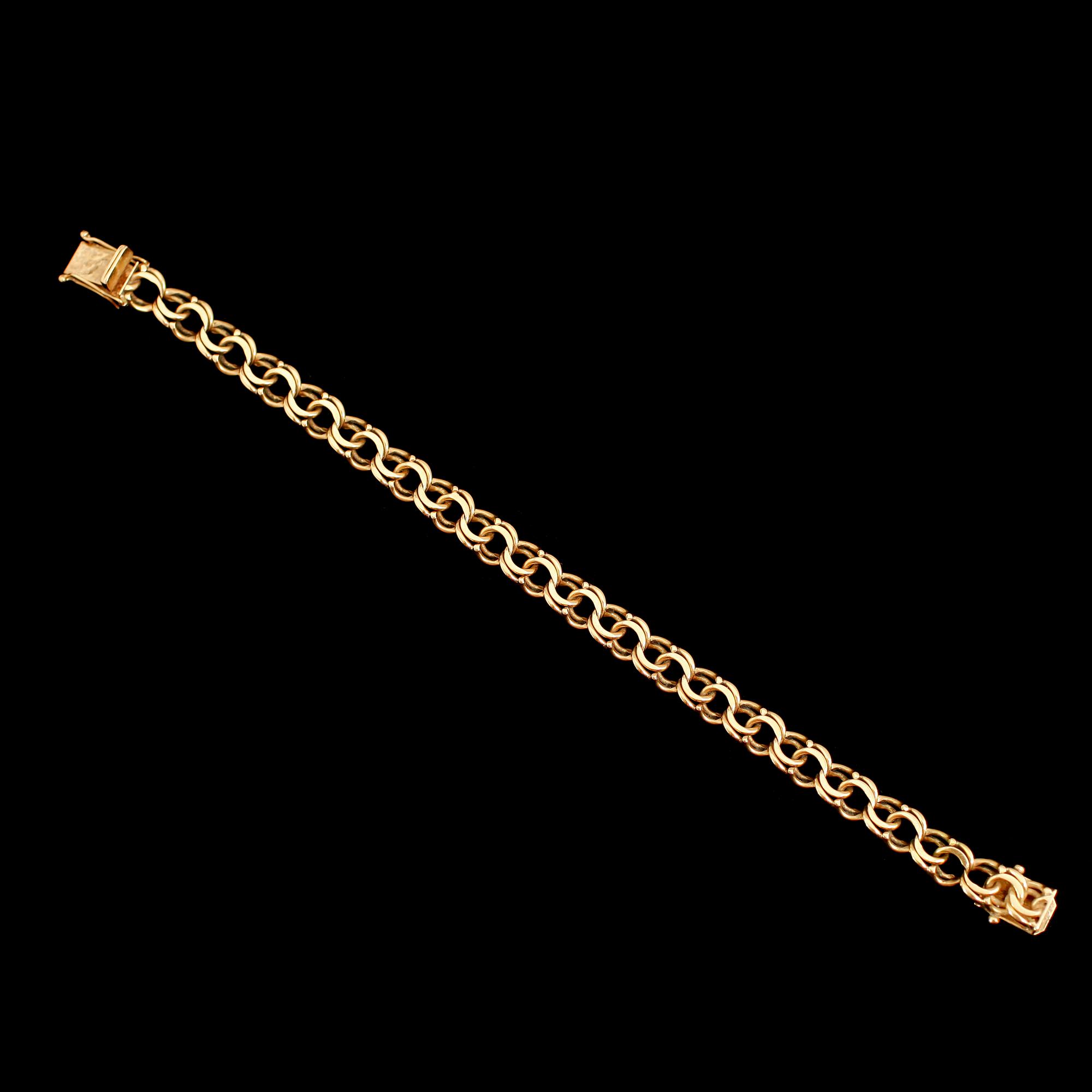 ARMBAND, 18 k guld, 1967. Vikt ca 22 gram.