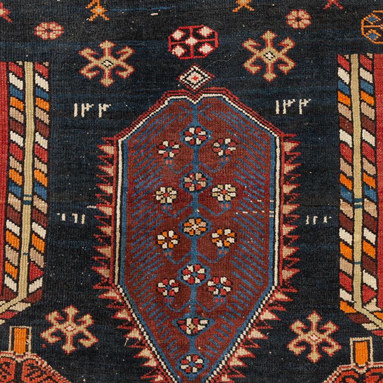 A Caucasian, antique rug, c. 225 x 125 cm.