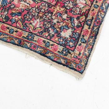 An Oriental carpet, c. 272 x 180 cm.