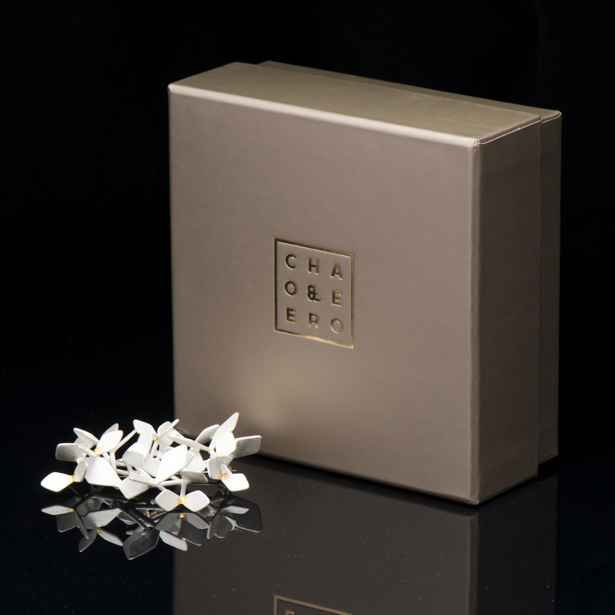 A CHAO-HSIEN KUO BROOCH, "Sparkling forest, white edition no. 1", silver, keum-boo 24K gold foil, steel, 2017.