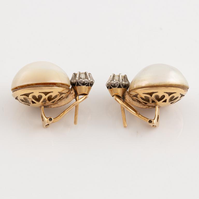 Gold and mabe pearl and brilliant cut diamond earrings.