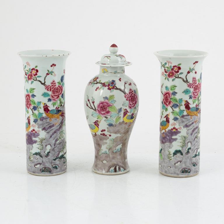 A three-piece famille rose garniture, Qing dynasty, 19th century.