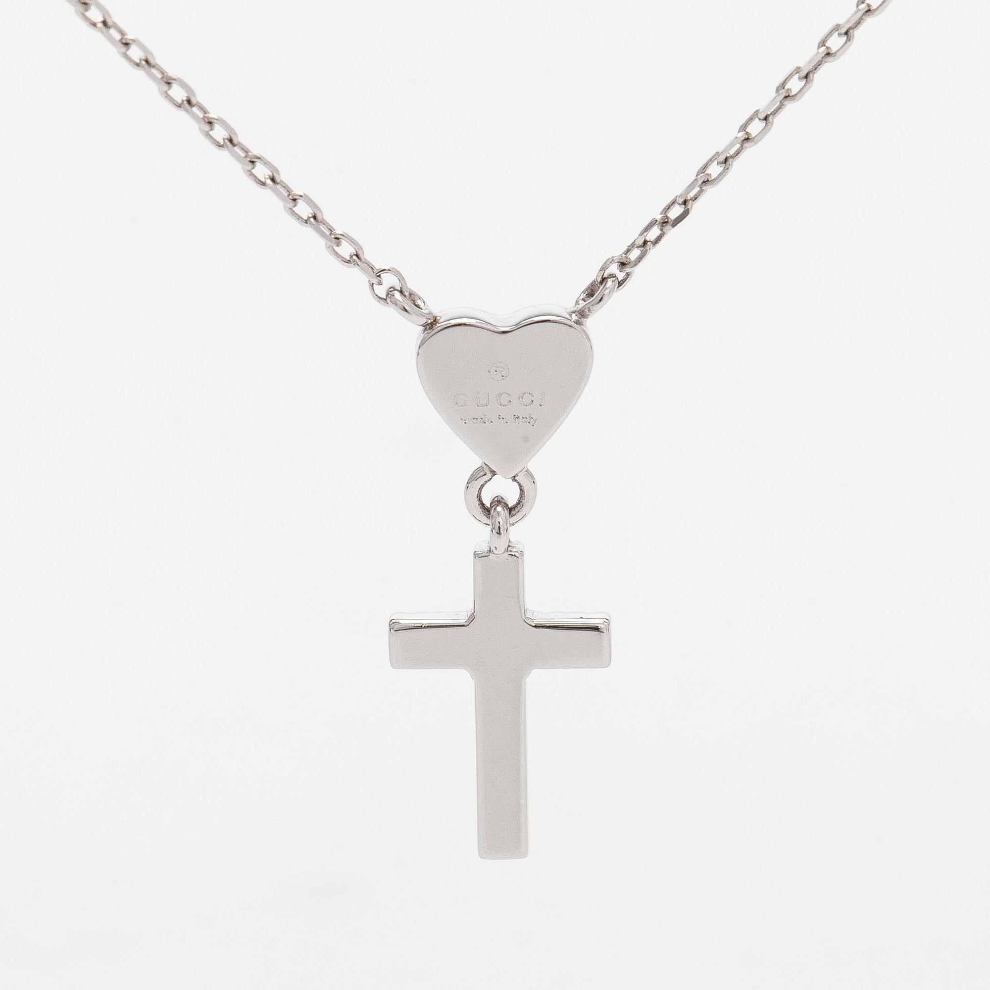 Gucci, an 18K white gold necklace with diamonds.
