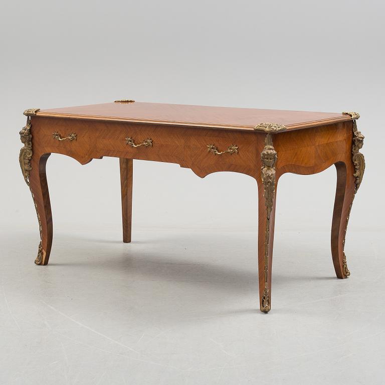 a rococo-style writing desk from the middle of the 20th century.