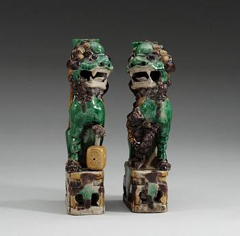 A pair of famille verte bisquit censers, Qing dynasty, 18th Century.