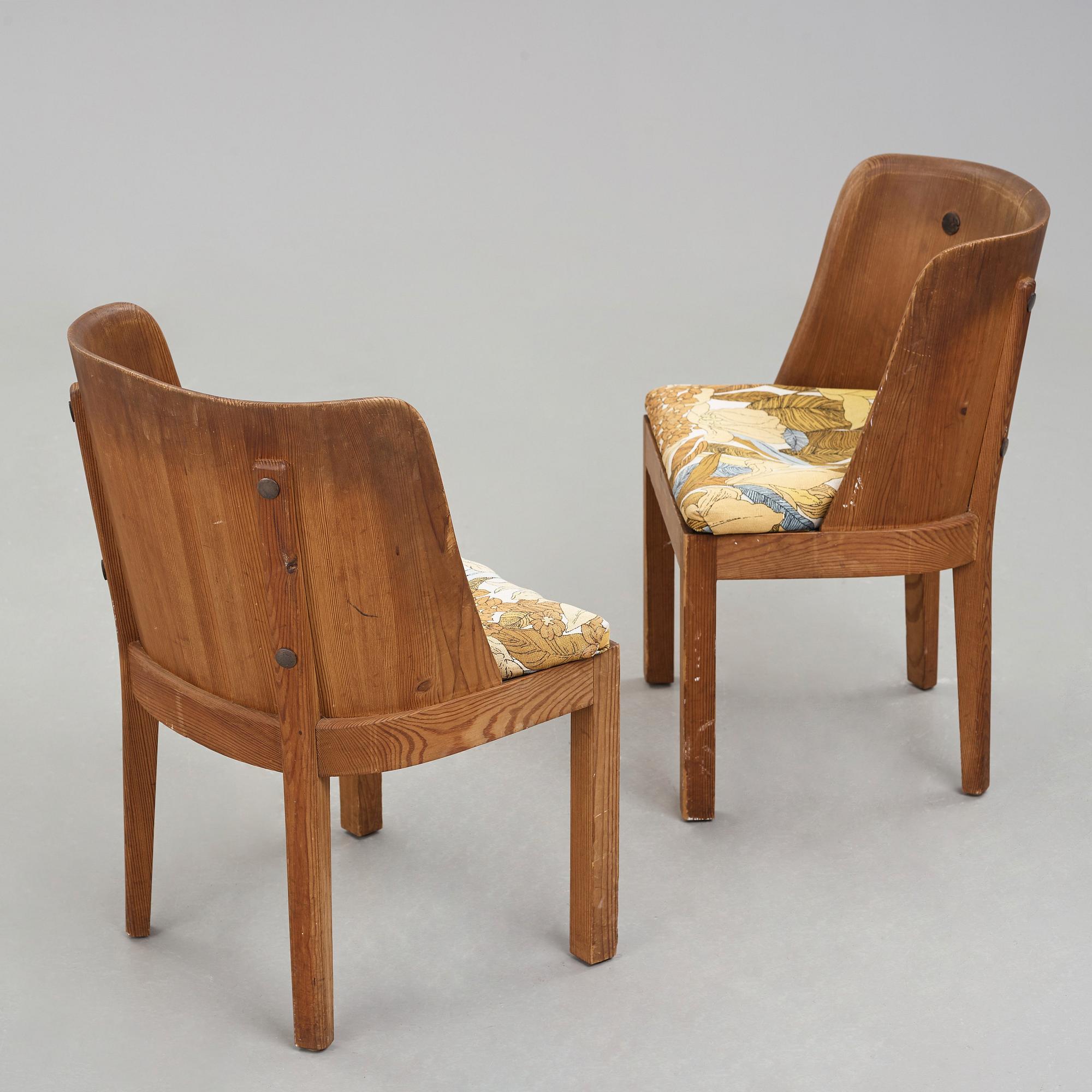 Axel Einar Hjorth, a pair of "Lovö" stained pine armchairs, Nordiska Kompaniet, Sweden 1930's.