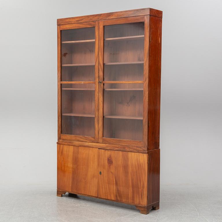 A second half of the 19th century mahogany veneered display cabinet.