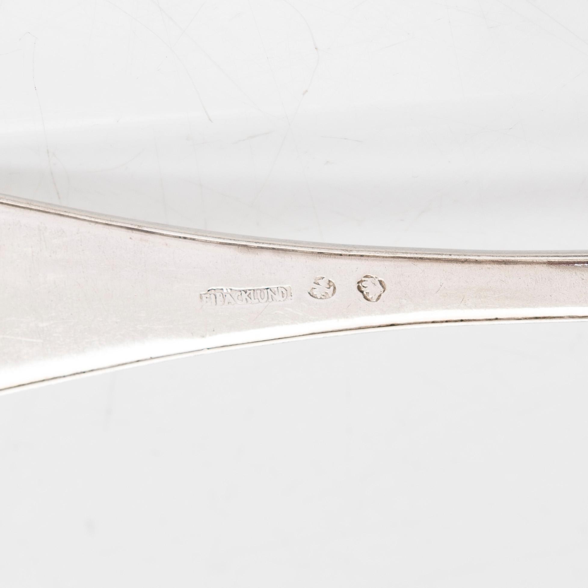 Six early 19th-century silver spoons, and a sprinkle spoon, mainly Tammisaari and Turku, Finland 1803-1820s.