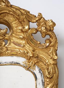 A giltwood rococo mirror, Stockholm, later part 18th century.