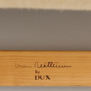 Bruno Mathsson, a pair of "Ingrid" armchairs, Dux, Sweden, second half of the 20th century.