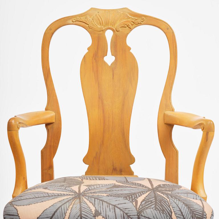 A pair of rococo open-back armchairs, Stockholm, later part 18th century.