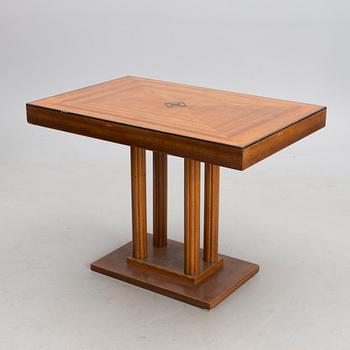 An early 20th century six-piece set of furniture by Armas Lindgren and Onni Tarjanne.