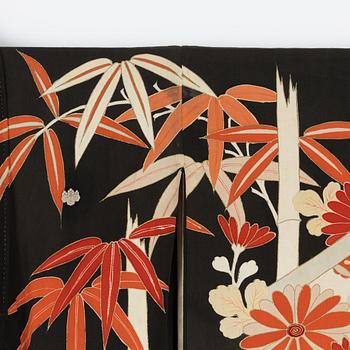 A painted and embroidered silk kimono. Japan, 20th century.