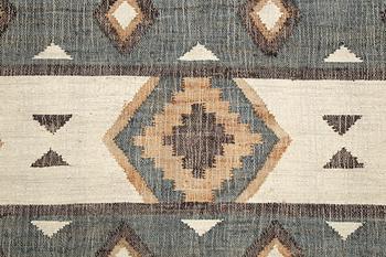 An Indian flat weave carpet,  approx. 287 x 174 cm.