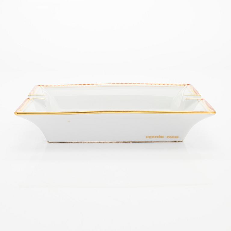 Hermès, a porcelain ashtray, France.
