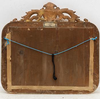 A rococo style mirror by AG Säfström Kristianstad from around the year 1900.