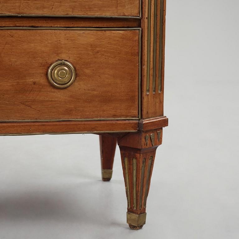 A late Gustavian mahogany and gilt-brass mounted commode, Stockholm, late 18th century.