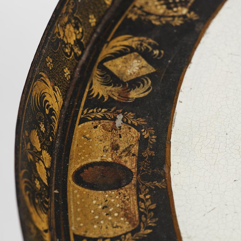A tole-peinte Empire tray, first part 19th century on a later stand.