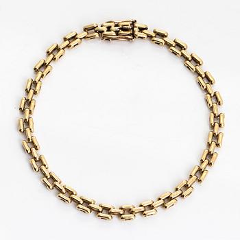 Necklace, set with a brilliant-cut diamond, and bracelet, 18K gold. Finnish import marks 1990.