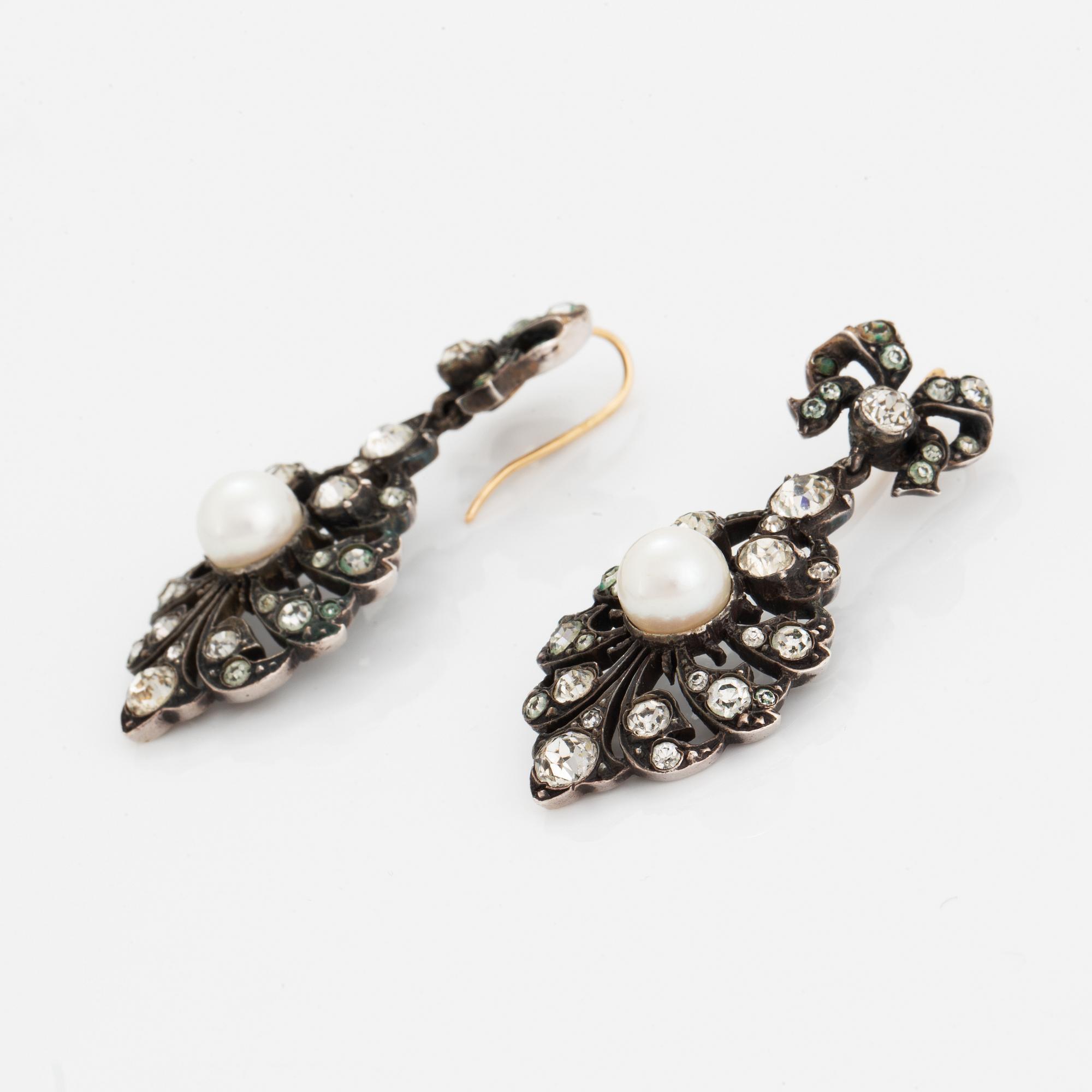 Earrings, brooch, and pendant silver with paste.