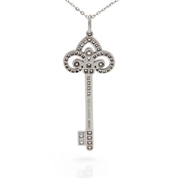 A 'Fleur de lis key' pendant set with round, brilliant-cut diamonds by Tiffany together with a chain.
