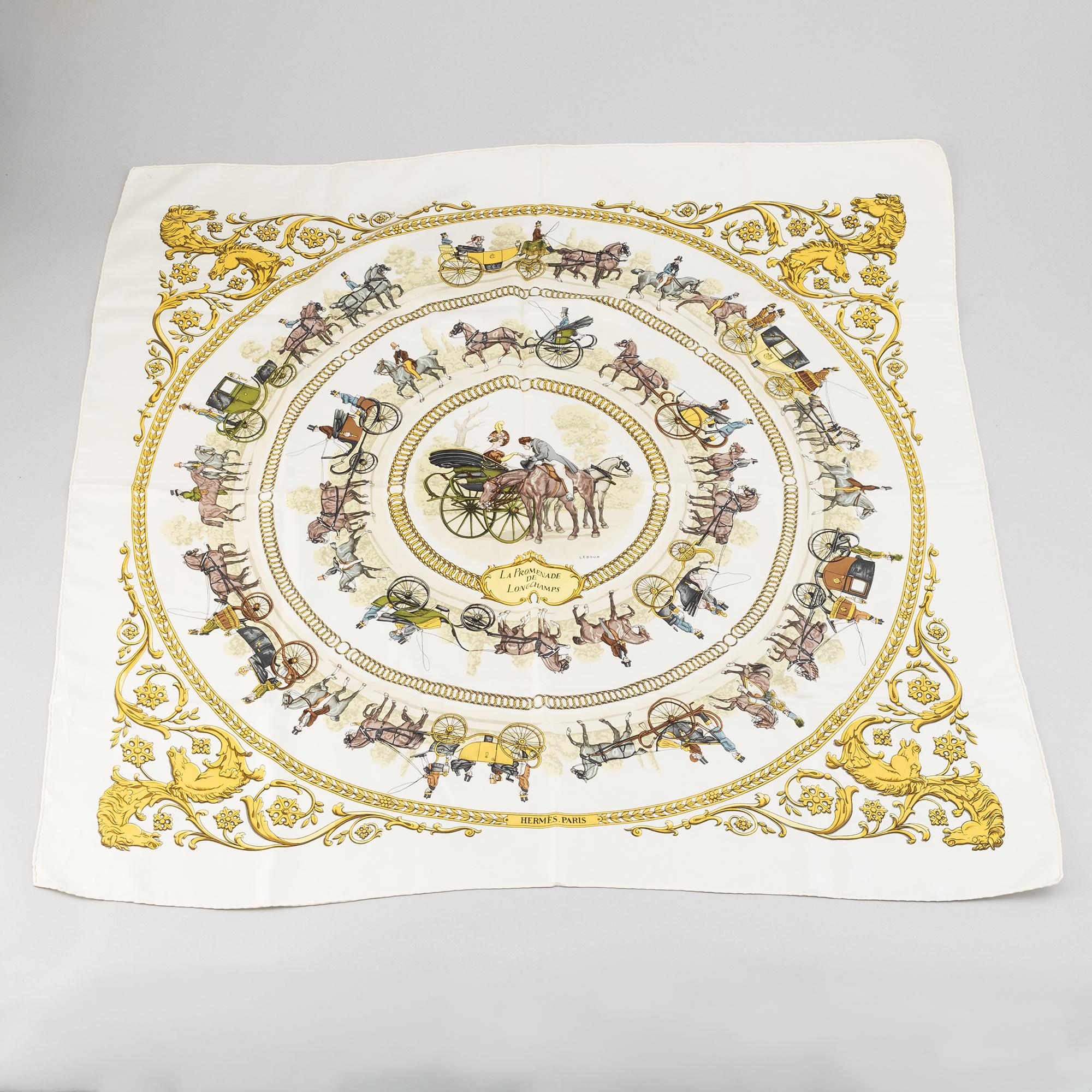 Hermès, a 'La Promenade de Longchamps' silk scarf.