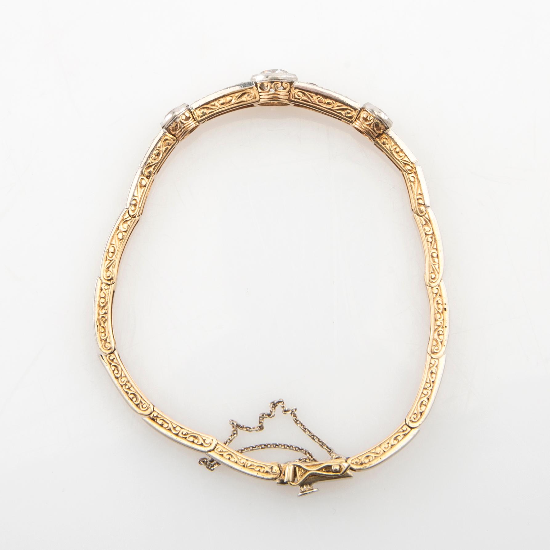 Bracelet 14K gold and platinum with round old-cut diamonds approximately 1.74 ct in total.