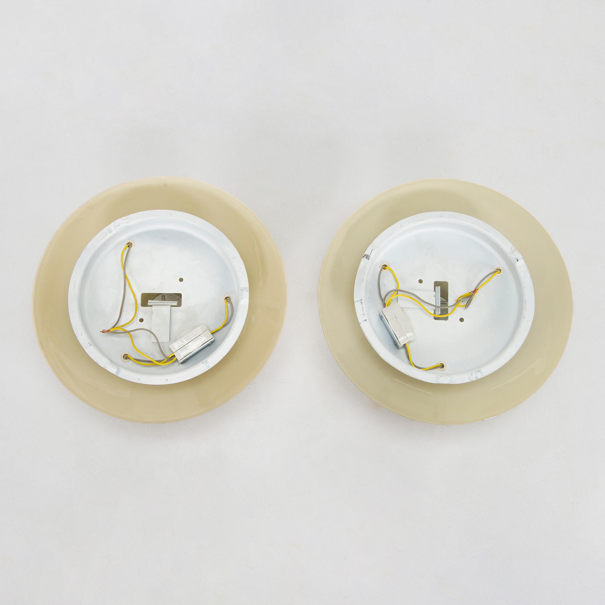 A pair of mid-20th century 'EA 72 ceiling lights for Itsu.