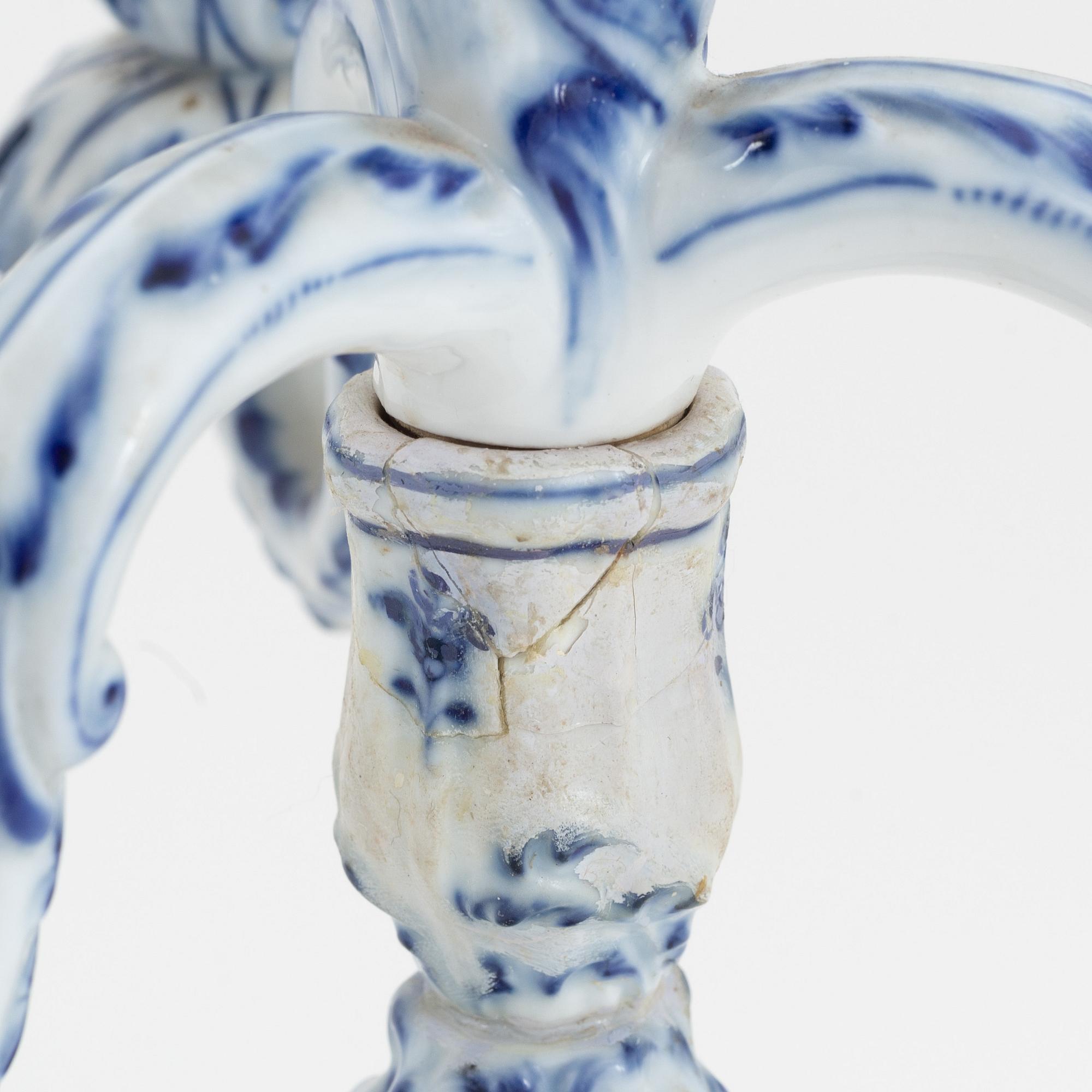 A pair of rococo style porcelain candelabras, Meissen, Germany, early 20th century.