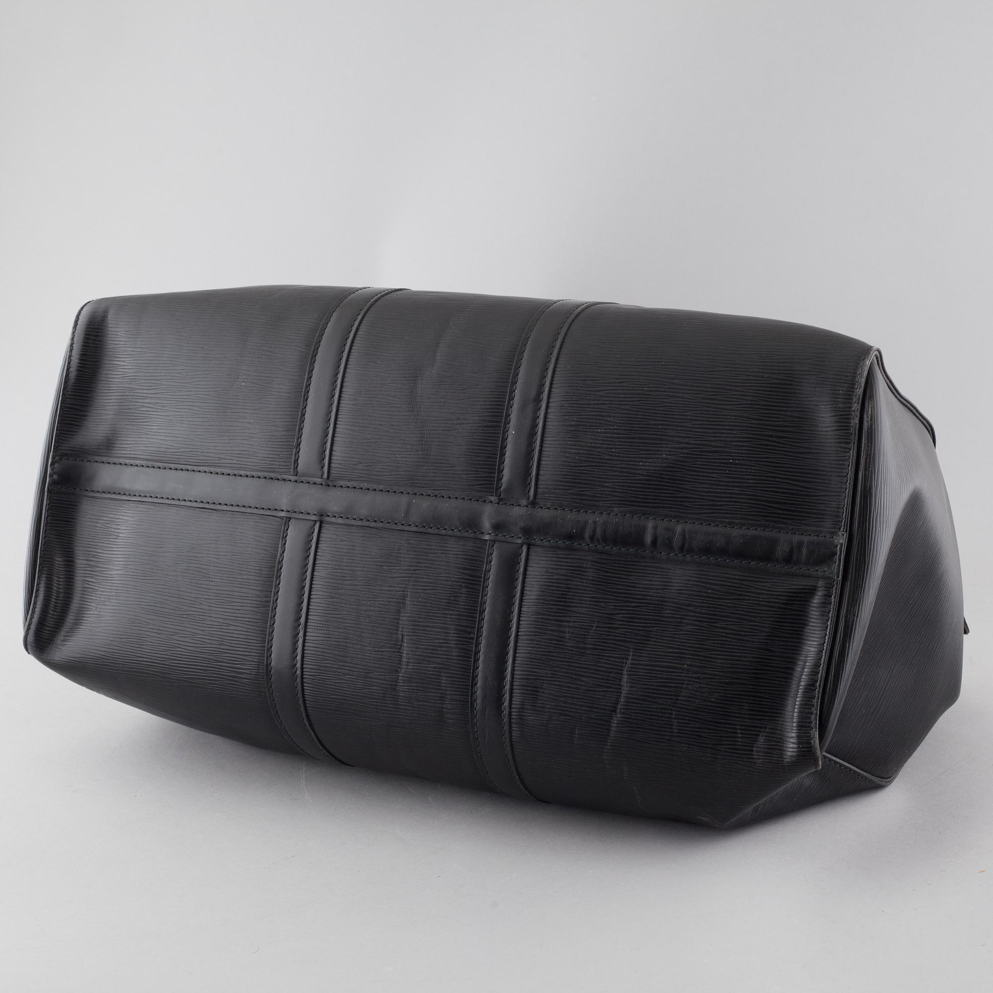 A weekend bag from Louis Vuitton, model "Keepall 50 Epi".