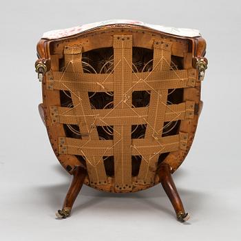 A late 19th century armchair in Rococo style.