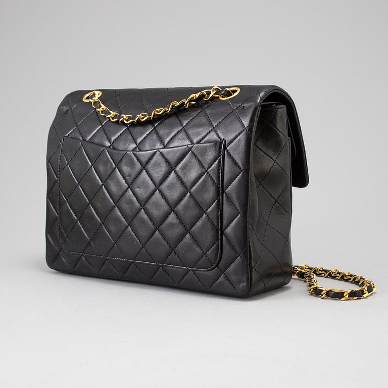 A "Double Flap bag" by Chanel.