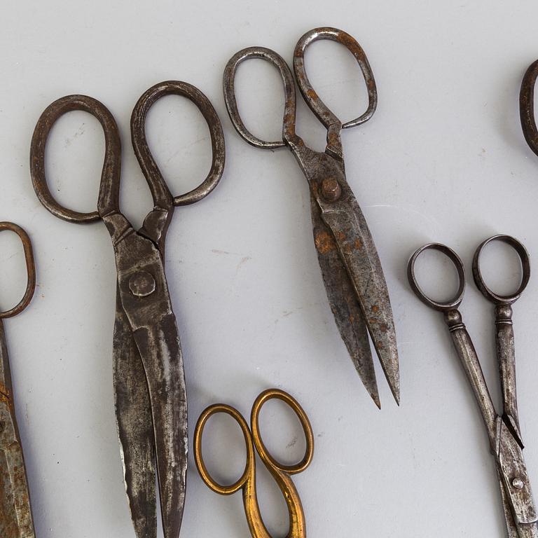 9 pair of iron and metal scissors from the 19th century.