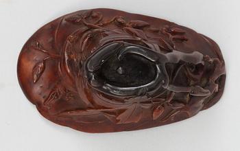 A rhinoceros horn libation cup, Qing dynasty, Kangxi (1662-1722).