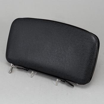 LOUIS VUITTON, an 'Atoll Ardiose' Taiga leather trave organizer, 2015.