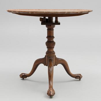 A 18th century English bird cage table.