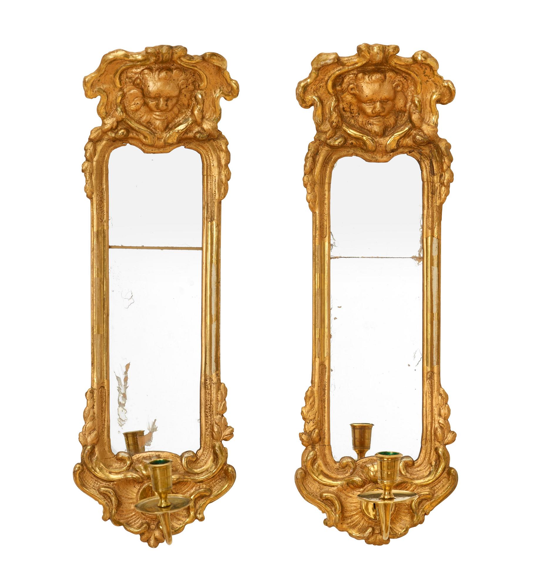 A pair of Swedish Rococo 18th century one-light girandole mirrors.