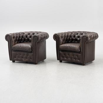 A pair of model Chesterfield armchairs, OY BJ Dahlqvist AB, BD Furniture,Finland, second half of the 20th century.