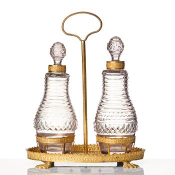 A Empire gilded brass and glass, cruet-set.