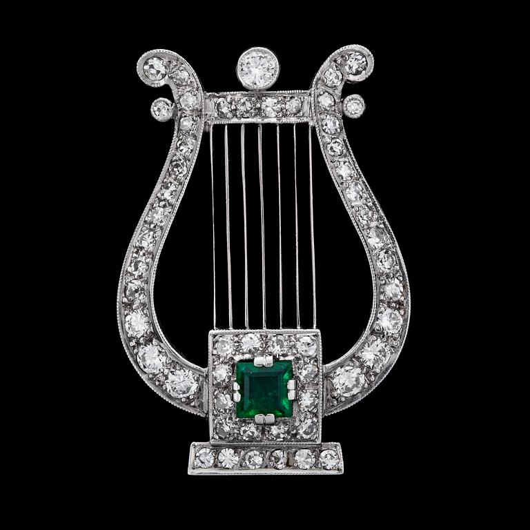A diamond and emerald brooch, late 1940's.