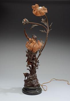 An Art Noveau zink table lamp, ca 1900.