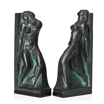 362. Axel Gute, a pair of patinated bronze bookends, early 1900s.