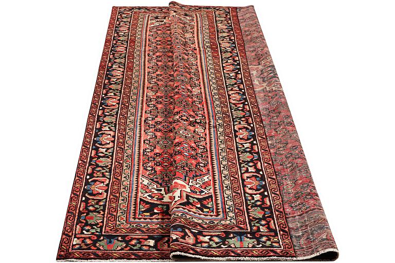 A carpet, Hosseinabad, ca. 348 x 248 cm.